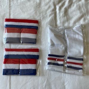 Red white and blue tube socks and wrist and headband sets